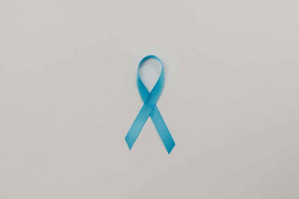 a blue satin ribbon on white background