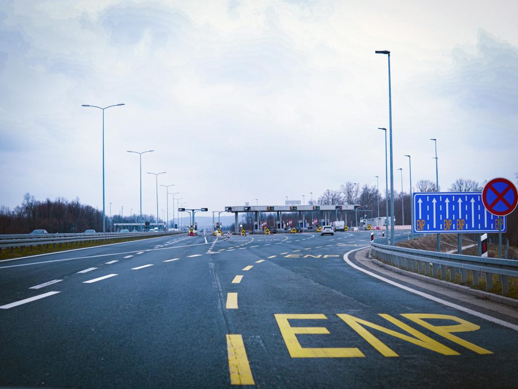european highway toll plaza on a cloudy day